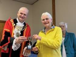 Annual award winner Angela Bamping receives EHS Photographic Cup.