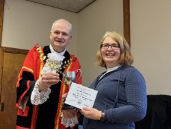 Annual award winner Jane Mackenzie receives T G Cross Memorial Trophy for highest points in horticulture.