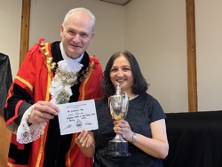 Annual Award winner Lata Malviya receives St Catherine's Cup for highest points in home produce.