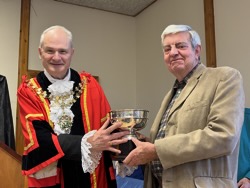 Annual award winner Stephen James receives Bertram Park Rose Bowl for highest points in roses.