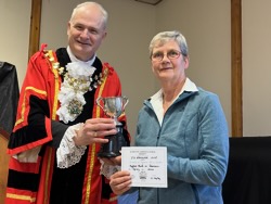 Sue Place collects J S Ranger Cup on behalf of FEHG for highest points in daffodils.